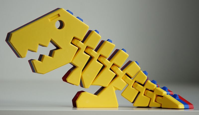 Viewing 3d-printing→toys→flexi-rex→yellow-blue-red